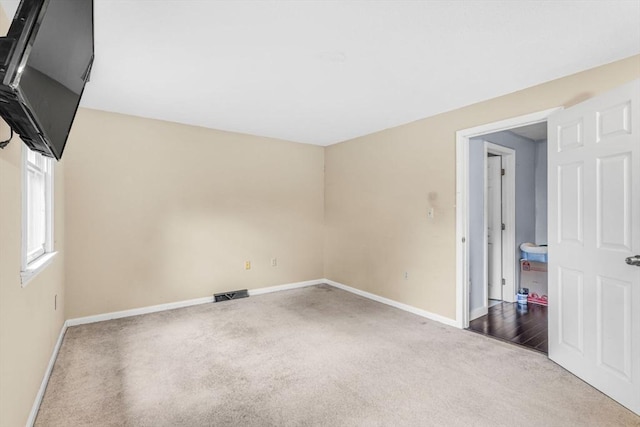 19 Doane Unit 1, Lowell, MA 01851 - carpeted empty room featuring baseboards