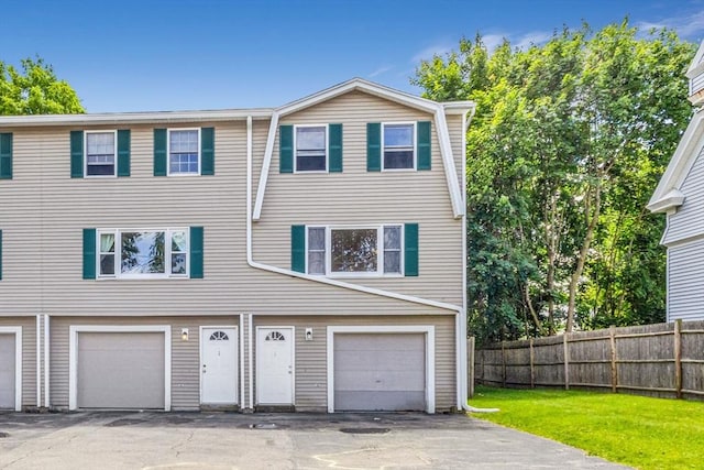 19 Doane Unit 1, Lowell, MA 01851 - multi unit property with an attached garage and asphalt driveway