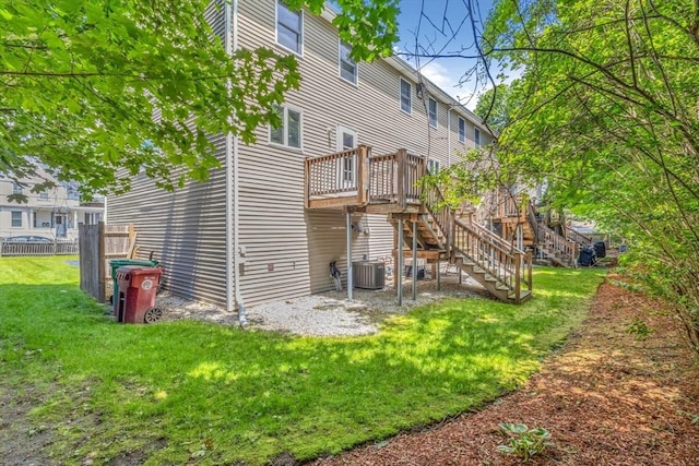 19 Doane Unit 1, Lowell, MA 01851 - rear view of property with stairs and a deck