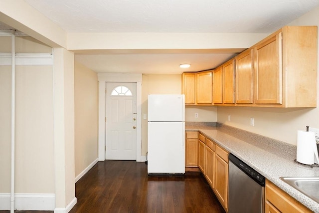 139 Endicott St, Worcester, MA 01610 - kitchen featuring freestanding refrigerator, stainless steel dishwasher, dark wood-style flooring, light countertops, and baseboards