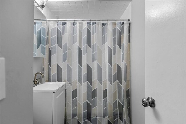 239 Glasgow St Unit 12, Fall River, MA 02721 - bathroom featuring vanity and a shower with shower curtain