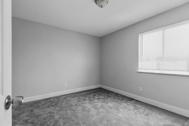 239 Glasgow St Unit 12, Fall River, MA 02721 - spare room featuring carpet and baseboards