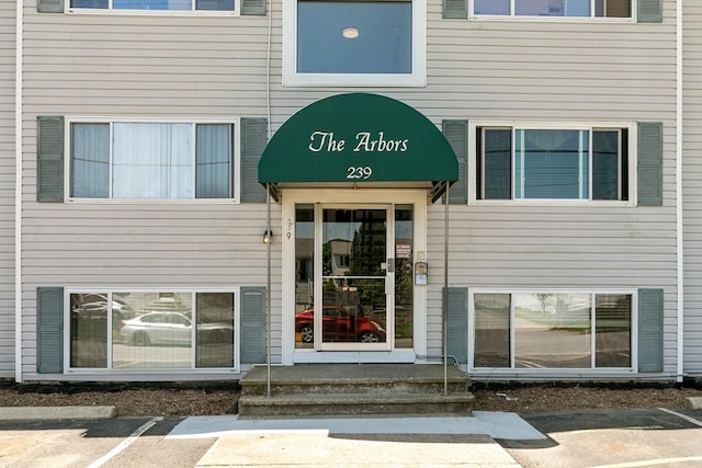 239 Glasgow St Unit 12, Fall River, MA 02721 - view of exterior entry with uncovered parking