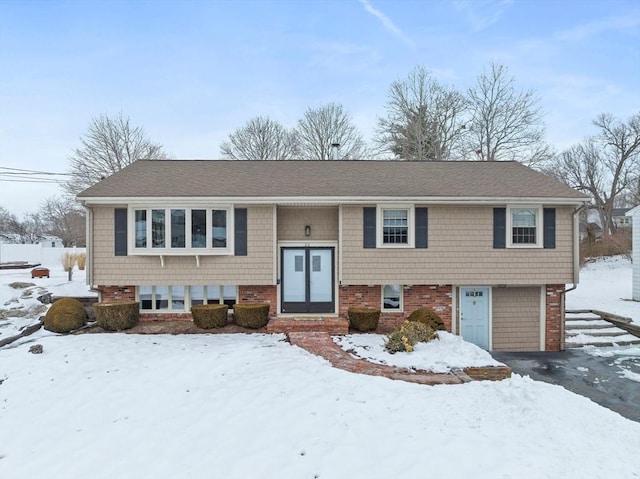 raised ranch with brick siding