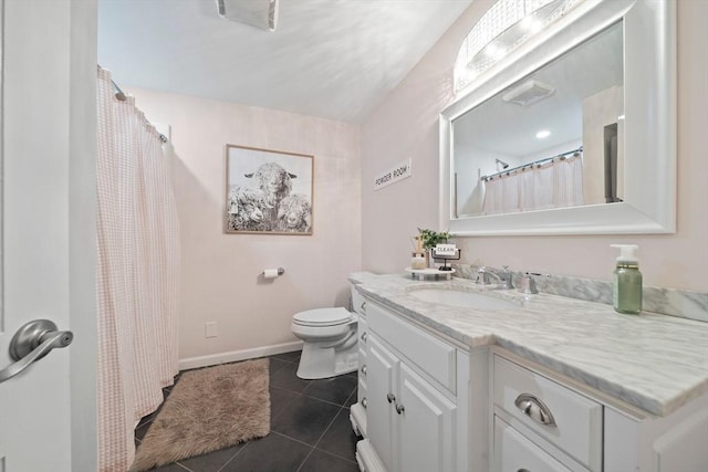 bathroom with tile patterned flooring, toilet, visible vents, vanity, and baseboards