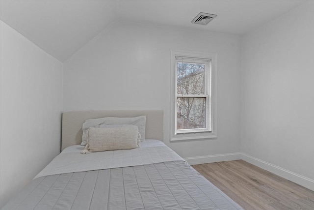 bedroom with light hardwood / wood-style flooring