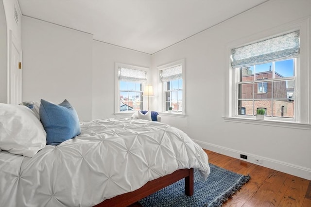 101 Pinckney St, Boston, MA 02114 - bedroom featuring baseboards and wood finished floors