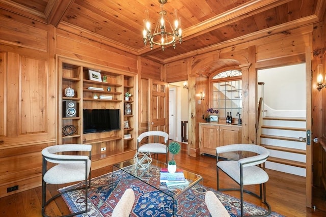 101 Pinckney St, Boston, MA 02114 - living area featuring wooden walls, stairway, dark wood-style floors, a chandelier, and wooden ceiling