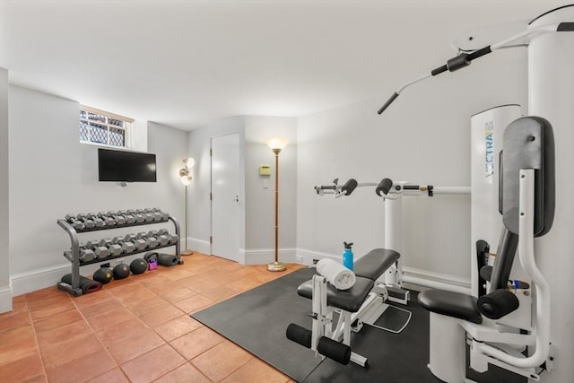 101 Pinckney St, Boston, MA 02114 - workout area with baseboards and tile patterned flooring