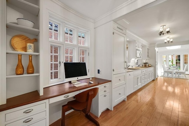 101 Pinckney St, Boston, MA 02114 - office with crown molding, light wood-style floors, and a healthy amount of sunlight