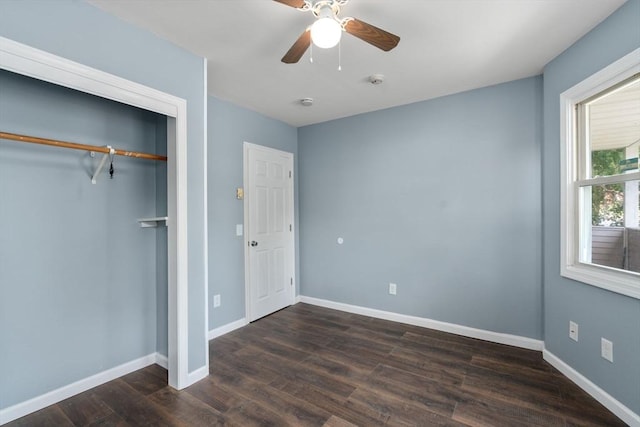 404-406 Franklin St, Springfield, MA 01104 - unfurnished bedroom with dark wood-style flooring, baseboards, a closet, and a ceiling fan
