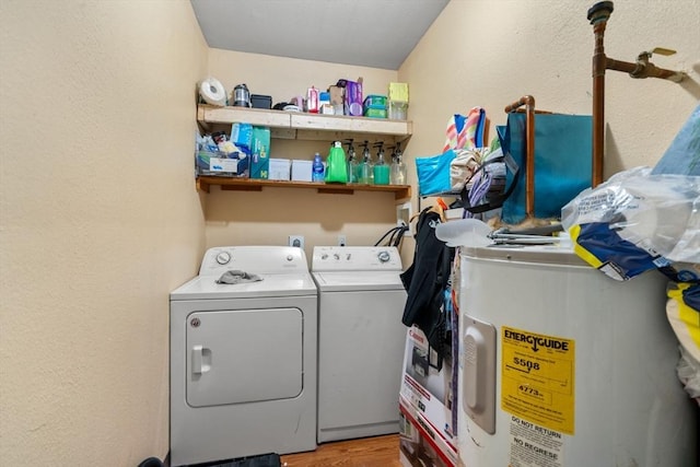 404-406 Franklin St, Springfield, MA 01104 - laundry room featuring washer and dryer, water heater, and light wood finished floors