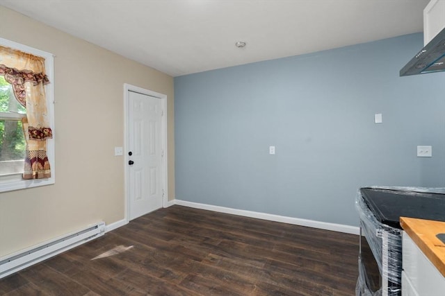 404-406 Franklin St, Springfield, MA 01104 - unfurnished office featuring a baseboard radiator, dark wood finished floors, and baseboards