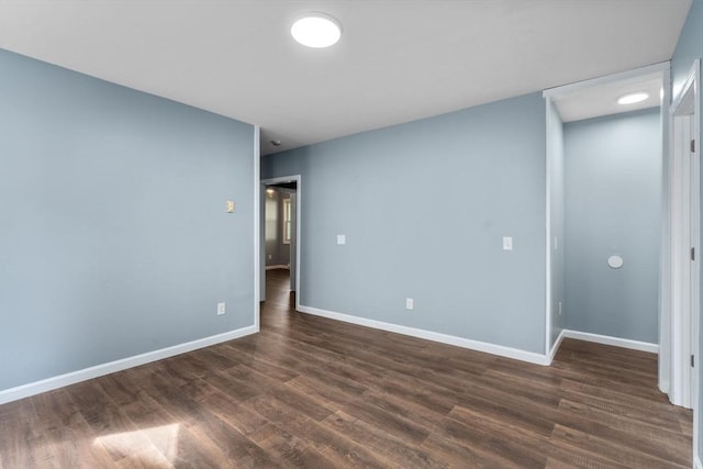404-406 Franklin St, Springfield, MA 01104 - spare room featuring dark wood-style flooring and baseboards