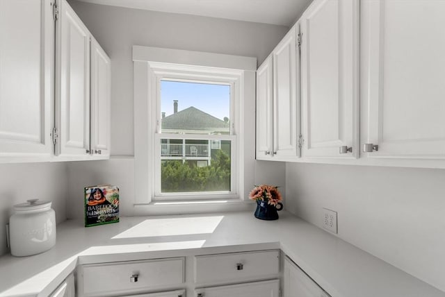 kitchen featuring white cabinetry