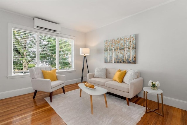 living room featuring a wall unit AC and hardwood / wood-style floors