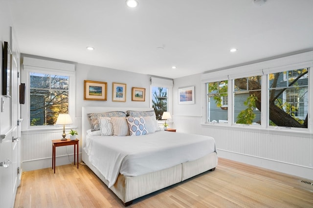 bedroom with light wood-type flooring