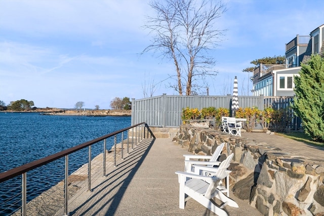 view of patio / terrace with a water view