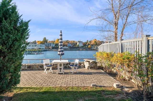 view of patio / terrace with a water view