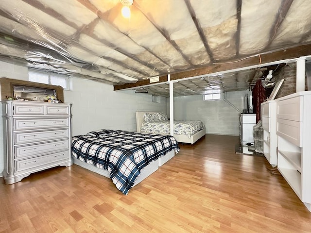 bedroom with hardwood / wood-style floors