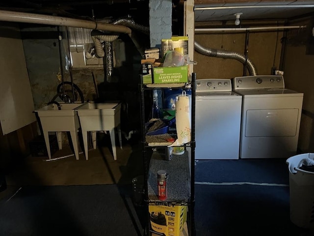 unfinished basement featuring washing machine and clothes dryer