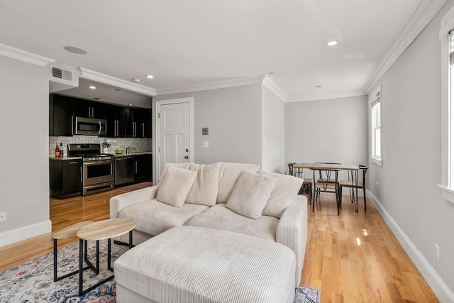 293 D St Unit 2, Boston, MA 02127 - living area with light wood-type flooring, ornamental molding, and recessed lighting