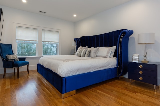 bedroom featuring light hardwood / wood-style flooring