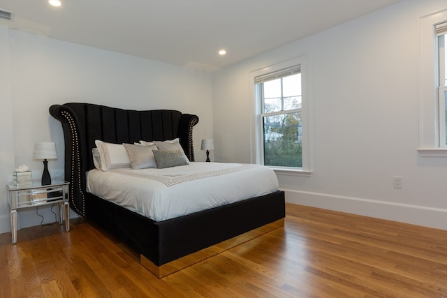 bedroom featuring light hardwood / wood-style floors