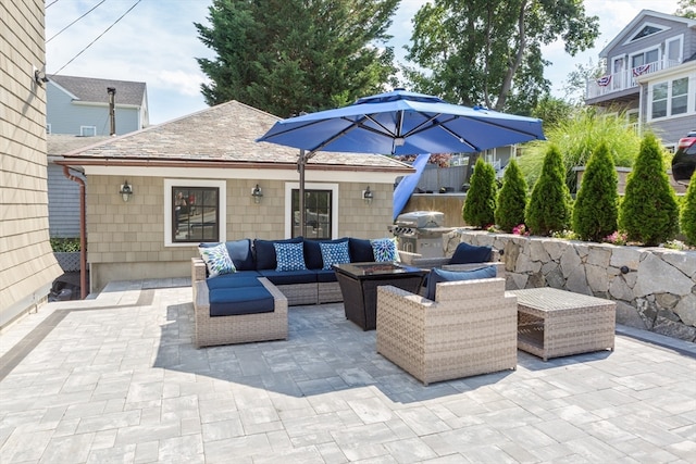 view of patio / terrace with a grill and outdoor lounge area