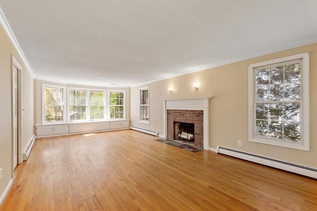 unfurnished living room with ornamental molding and a baseboard radiator
