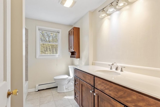 full bath featuring vanity, toilet, tile patterned floors, baseboards, and a baseboard radiator