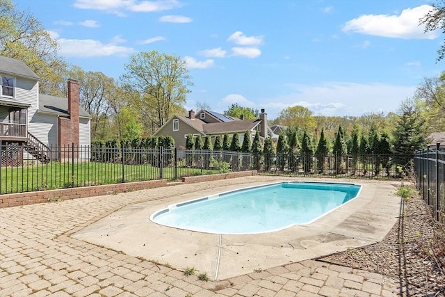 view of pool featuring a fenced in pool and fence