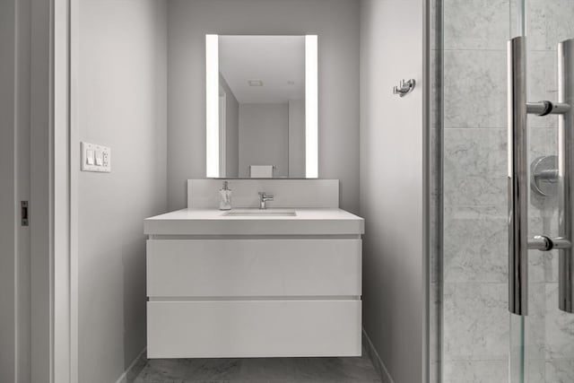 133 Seaport Blvd Unit 1710, Boston, MA 02210 - bathroom featuring baseboards, a shower stall, and vanity