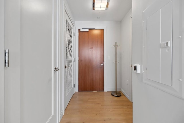 133 Seaport Blvd Unit 1710, Boston, MA 02210 - hallway featuring baseboards and light wood finished floors