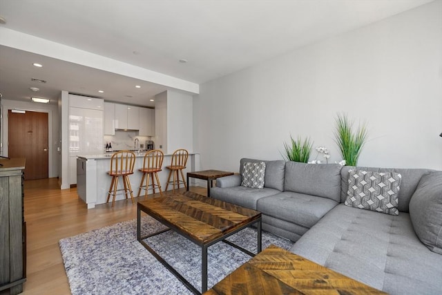 133 Seaport Blvd Unit 1710, Boston, MA 02210 - living area with recessed lighting and light wood finished floors