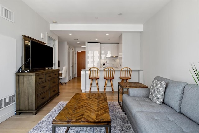 133 Seaport Blvd Unit 1710, Boston, MA 02210 - living area featuring visible vents, recessed lighting, and light wood finished floors