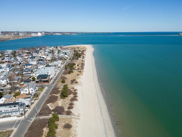 bird's eye view with a view of the beach and a water view