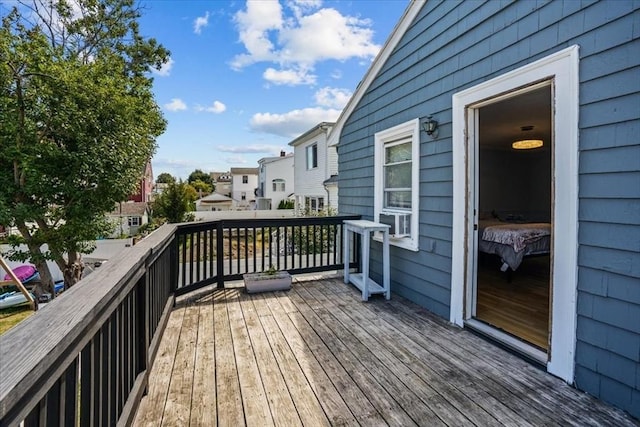 wooden deck with a residential view