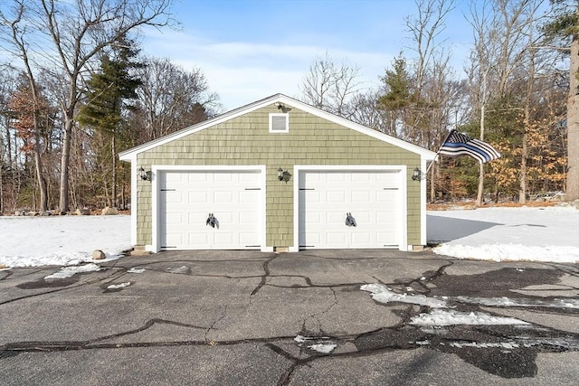 view of snow covered garage