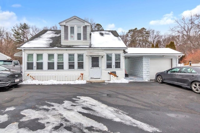 view of front of house featuring driveway and an attached garage