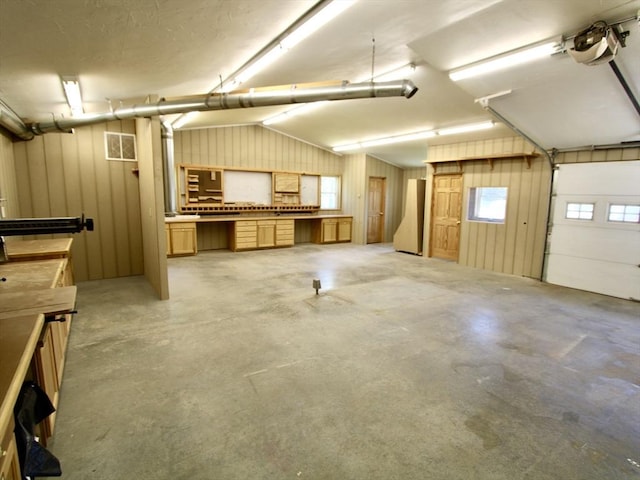25 Rollinson Rd, Worcester, MA 01606 - garage featuring a garage door opener