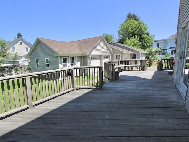 25 Rollinson Rd, Worcester, MA 01606 - wooden terrace featuring a residential view, an attached garage, and a lawn