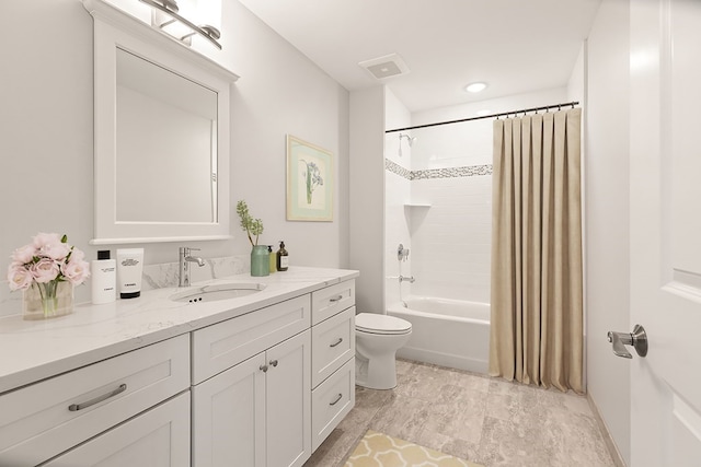 full bathroom with vanity, toilet, and shower / bath combination with curtain