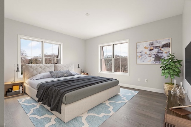 bedroom with hardwood / wood-style floors