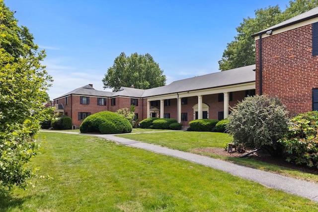 358 Lexington St Unit 358, Watertown, MA 02472 - greek revival house with a front lawn and brick siding