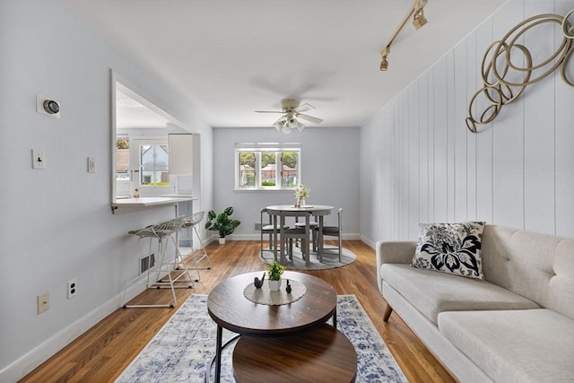 358 Lexington St Unit 358, Watertown, MA 02472 - living room with a ceiling fan, wood finished floors, and rail lighting