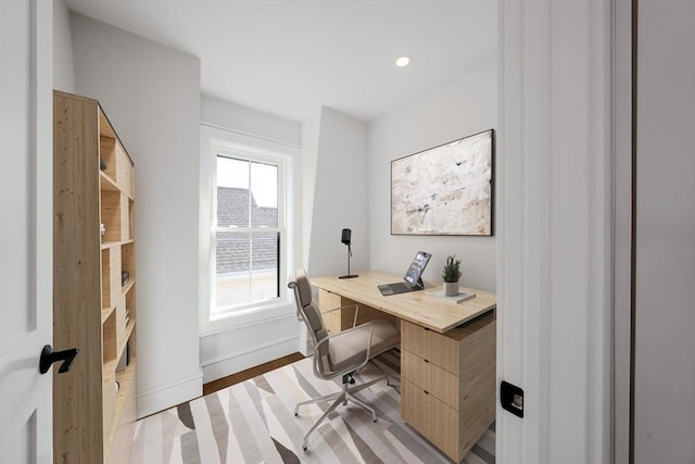 office featuring light wood-type flooring, baseboards, and recessed lighting