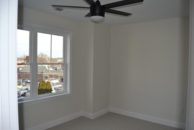 empty room featuring ceiling fan