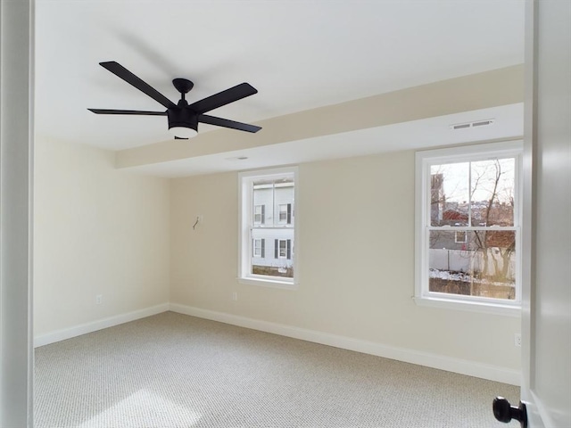 carpeted empty room with ceiling fan