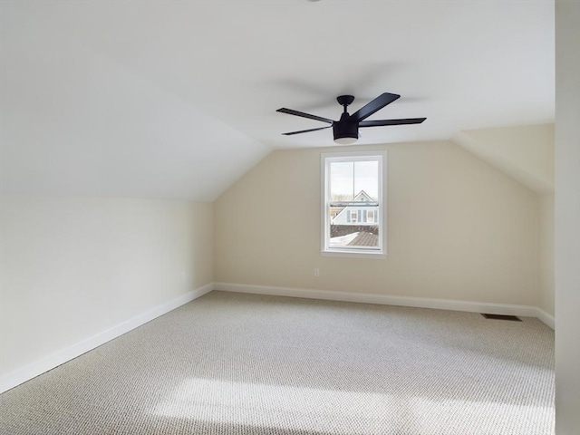 bonus room featuring vaulted ceiling, ceiling fan, and carpet floors